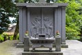 Grave in graveyard, Kanazawa, Japan.TRANSLATION: Palace of the phoenix