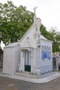 Grave monument with statue and azulejos in Alto de Sao Joaoa cemetery, Lisbon