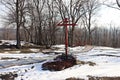 Grave mound on the territory of the Belogorsky Monastery in Russia. February 2020