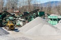 Gravel aggregate extraction. Machinery distribution and classification by size gravel. Royalty Free Stock Photo