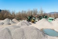 Gravel aggregate extraction. Machinery distribution and classification by size gravel. Royalty Free Stock Photo