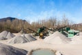 Gravel aggregate extraction. Machinery distribution and classification by size gravel. Royalty Free Stock Photo