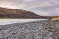 Gravel beach at Laguna Amarga before sunrise with focus bracketing, Chile, Patagonia