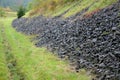 Gravel gray basalt, coarse is used as drainage strips above the road in the notch of the highway. The stones can serve as a shelte