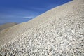 Gravel gray mound quarry stock blue sky