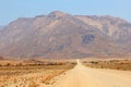 Gravel road Brandberg highest mountain, Damaraland, Namibia Royalty Free Stock Photo