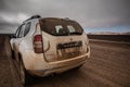 Gravel road with car in Skeleton Coast Park, Namibia. Royalty Free Stock Photo