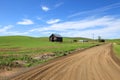 Gravel road through farms