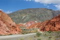 Gravel road through the hills of seven colors near Purmamarca Royalty Free Stock Photo