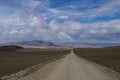 Gravel road in open spaces Royalty Free Stock Photo