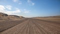 Gravel road in Skeleton Coast Park, Namibia. Royalty Free Stock Photo