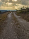 Gravel road in Texas Hill Country about to get wet Royalty Free Stock Photo