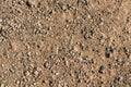 Gravel road texture. Sandy background with stones Royalty Free Stock Photo