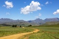 Gravel road to Bushmans Neck in Drakensberg Royalty Free Stock Photo