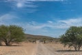 Gravel secondary road in northern Namibia Royalty Free Stock Photo