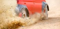 Gravel splashing from rally race car drift on track Royalty Free Stock Photo