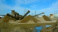 Gravel and stone quarry piles and machinery