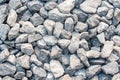 Gravel texture. Pebble stone background. Light grey closeup small rocks. Top view Royalty Free Stock Photo
