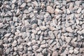 Gravel texture. Pebble stone background. Light grey closeup small rocks. Royalty Free Stock Photo