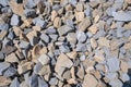 Gravel texture. Pebble stone background. Light grey closeup small rocks. Top view of ground gravel road Royalty Free Stock Photo