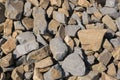 Gravel texture. Pebble stone background. Light grey closeup small rocks. Top view of ground gravel road. Royalty Free Stock Photo
