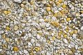 Gravel with white and yellow pebbles/texture background