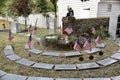 Graves at Grace Episcopal Church, decorated with American Flags. Yorktown VA, USA. October 4, 2019.