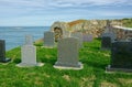 Graves on cliff edge. Final resting place with dramatic sea view.