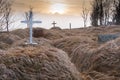 Graves in the KÃÂ¡lfafellsstadur Church graveyard in Iceland at sunset Royalty Free Stock Photo