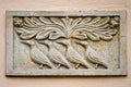 Gravestone with birds. bas-relief