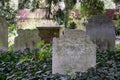 Gravestones in the cemetery at the historic Church of St Mary in Harmondsworth, west London, UK