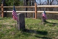 Gravestones grave markers of two Revolutionary War veterans with flags Royalty Free Stock Photo