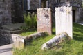Gravestones in a sunny country cemetery Royalty Free Stock Photo