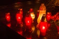 Graveyard candles on Polish cemetery during All Saints Day at night. Royalty Free Stock Photo