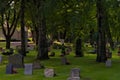 Graveyard with headstones and newly dug grave Royalty Free Stock Photo