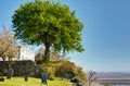 Graveyard and white house by sea Royalty Free Stock Photo