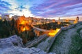 Gravina in Puglia ancient town, bridge and canyon at sunrise Royalty Free Stock Photo