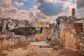 Gravina in Puglia, Bari, Italy: landscape at sunrise of the old town seen from the entrance of the ancient aqueduct bridge Royalty Free Stock Photo