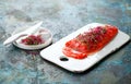 Gravlax, homemade salted sockeye salmon fillet with beetroot sprouts Royalty Free Stock Photo