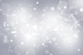 Gray abstract background. white bokeh snowflakes blurred beautiful shiny lights. use for Merry Christmas, happy new year wallpaper Royalty Free Stock Photo