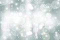 Gray abstract background. white light and snowflakes bokeh winter for Christmas new year blurred beautiful shiny lights Royalty Free Stock Photo