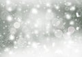 Gray abstract background. white light and snowflakes bokeh winter for Christmas new year blurred beautiful shiny lights Royalty Free Stock Photo