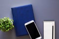 Office table with organizer, smartphone and stationary Royalty Free Stock Photo