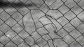 a torn metal mesh, in the photo a metal mesh on a green background