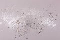 Gray background with silver sparkles and sequins, christmas concept festive texture for your design. Royalty Free Stock Photo