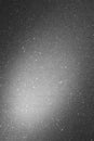 Gray background with sparkles and spot of light Royalty Free Stock Photo