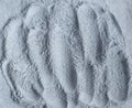 Gray bentonite facial clay powder alginate mask, face cream, body wrap texture close up, selective focus. Abstract background Royalty Free Stock Photo