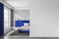 Gray and blue bedroom interior with blank wall Royalty Free Stock Photo