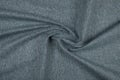 Gray blue fabric texture - close-up of a piece of crushed and twisted blue linen Royalty Free Stock Photo