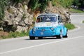 A gray and blue Fiat Abarth 595 takes part to the Nave Caino Sant'Eusebio race
